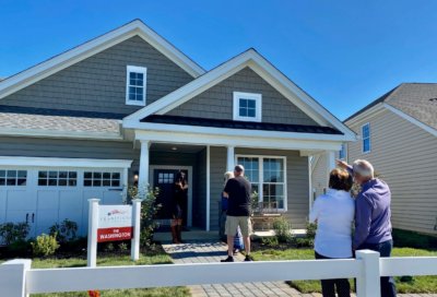 People touring model homes in the West brandywine community