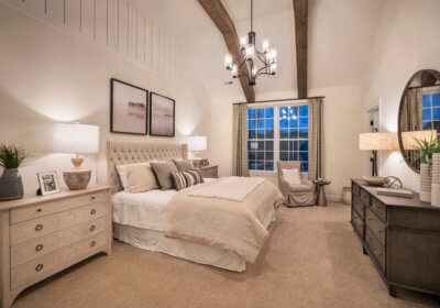 Master bedroom with high ceilings in a jefferson model from Traditions of America