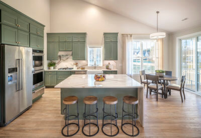 Kitchen with a center island in a traditions of america home