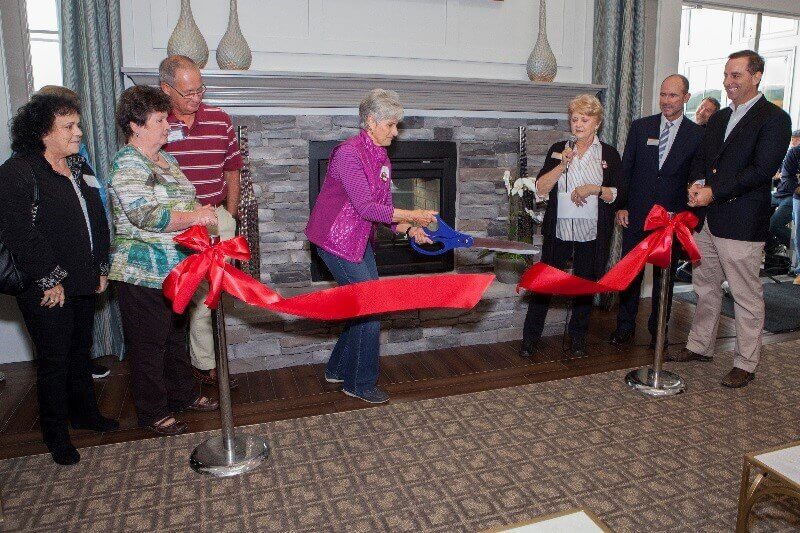 People cutting the ribbon at Saucon valley community clubhouse