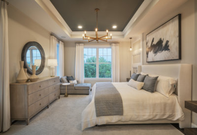 Master bedroom with couch in the Franklin model
