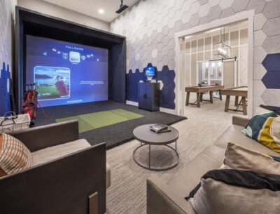 golf simulator area in a traditions of America community clubhouse