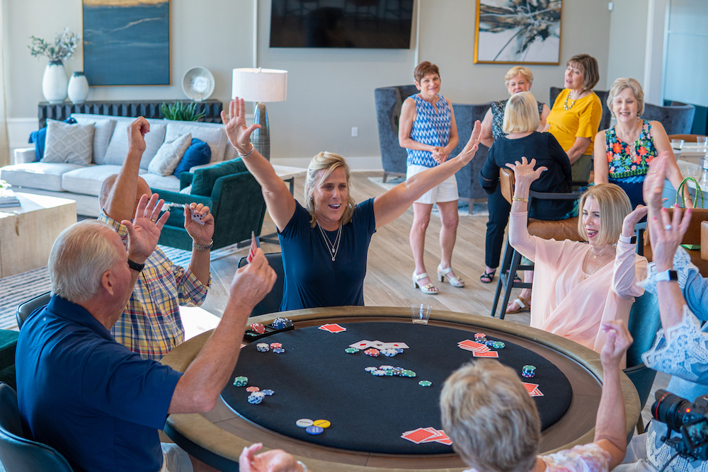 People Playing Poker In Traditions of America Clubhouse