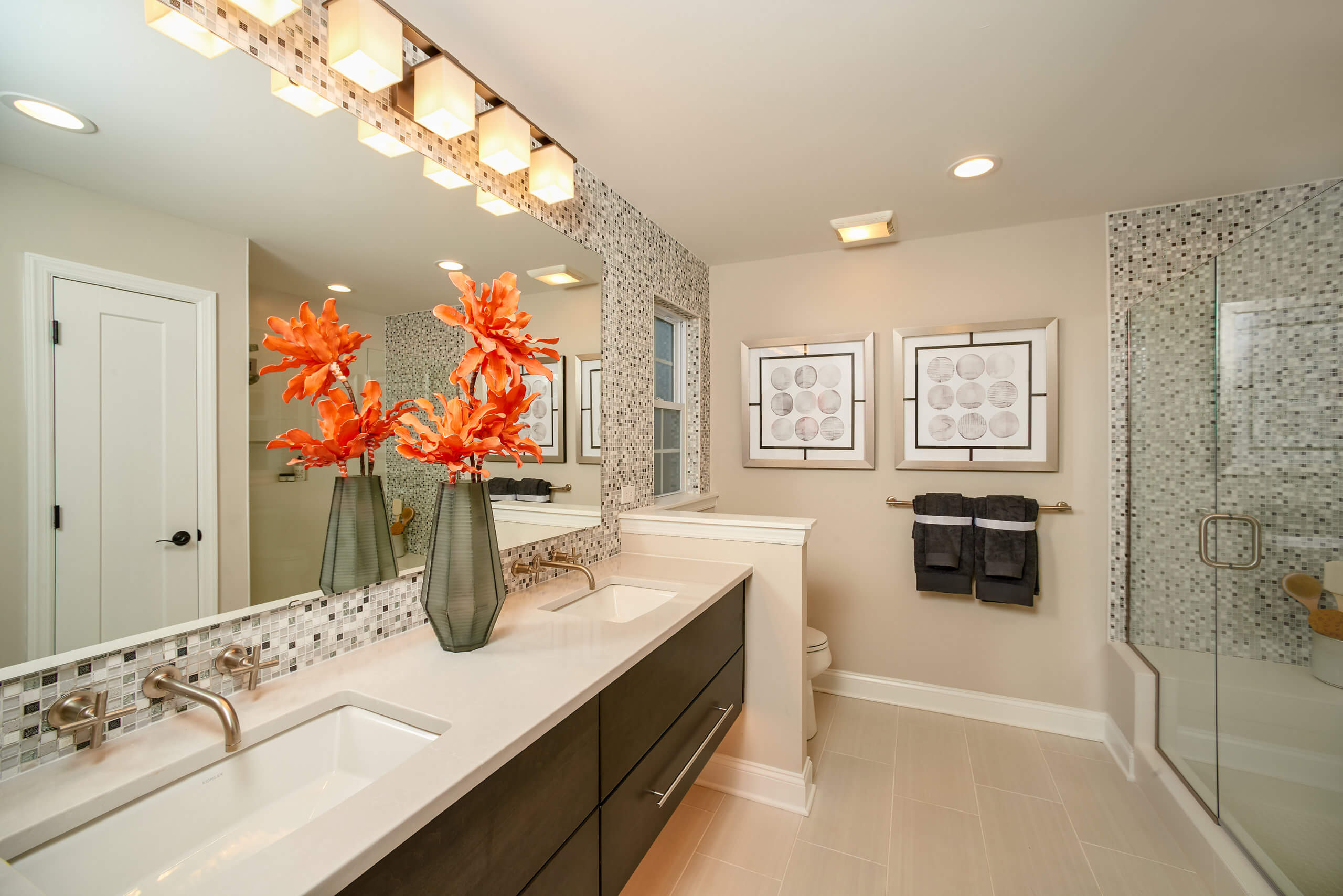 bathroom with orange flowers