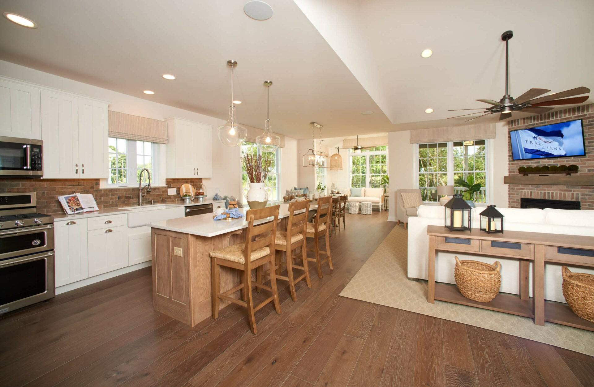 Kitchen with white cabinets and center island