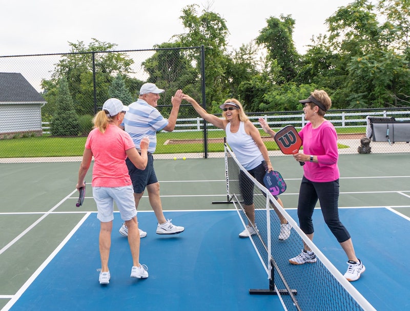 People Playing Pickle Ball At Traditions of America Chesterfield