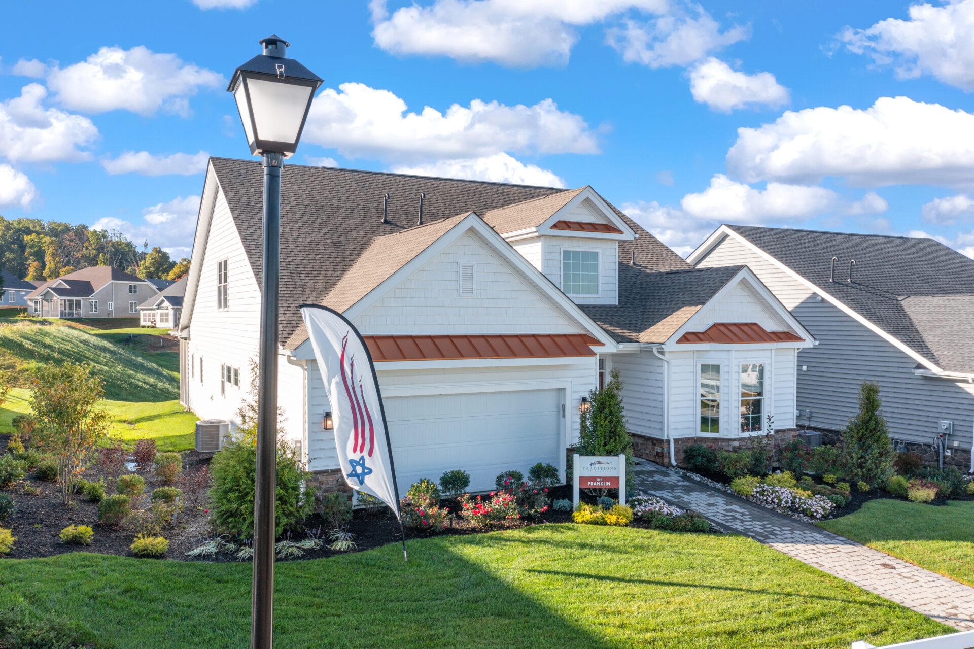 Front of a locust valley home from traditions of america