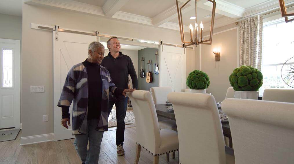 Two people Looking at the dining area of the Hancock